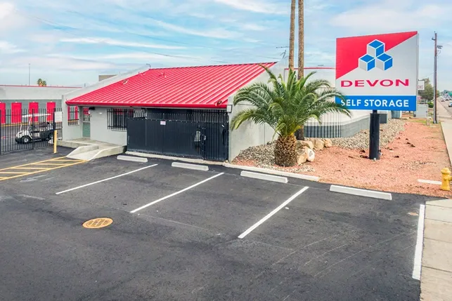 Devon Self Storage office building with signage and customer parking spaces